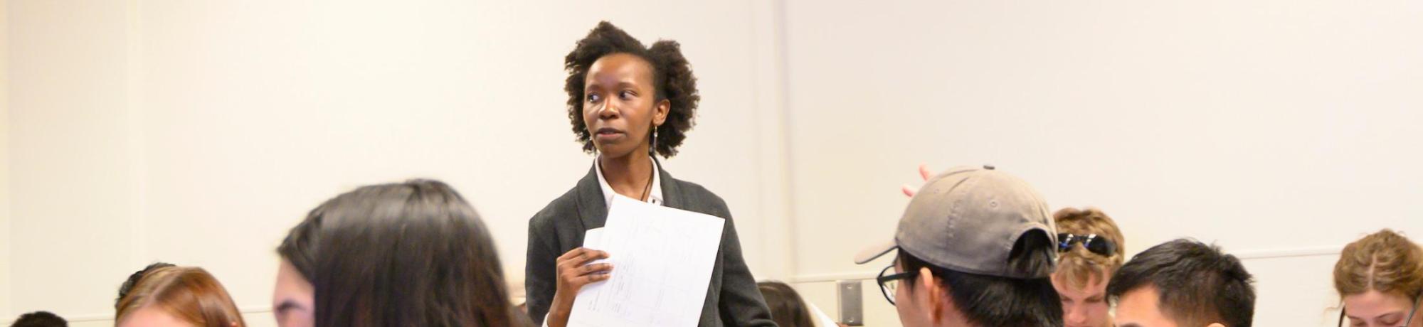 Assistant professor Maureen Kinyua talks to students about principles they should be watching for during Biological Principles of Environmental Engineering class